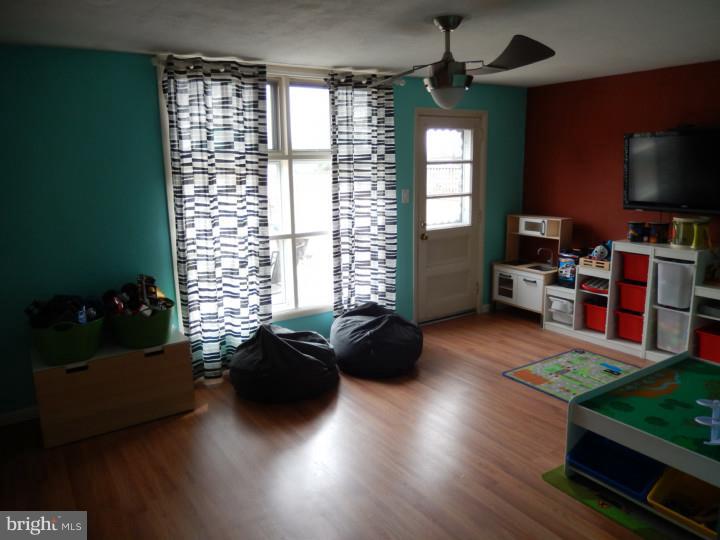 1241 Dill Road Havertown, PA 19083 - Photo 8 of 14 a living room with furniture and a flat screen tv
