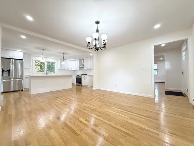 a view of a kitchen with a sink and cabinet area