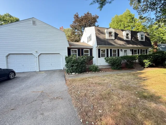 a house view with a garden space
