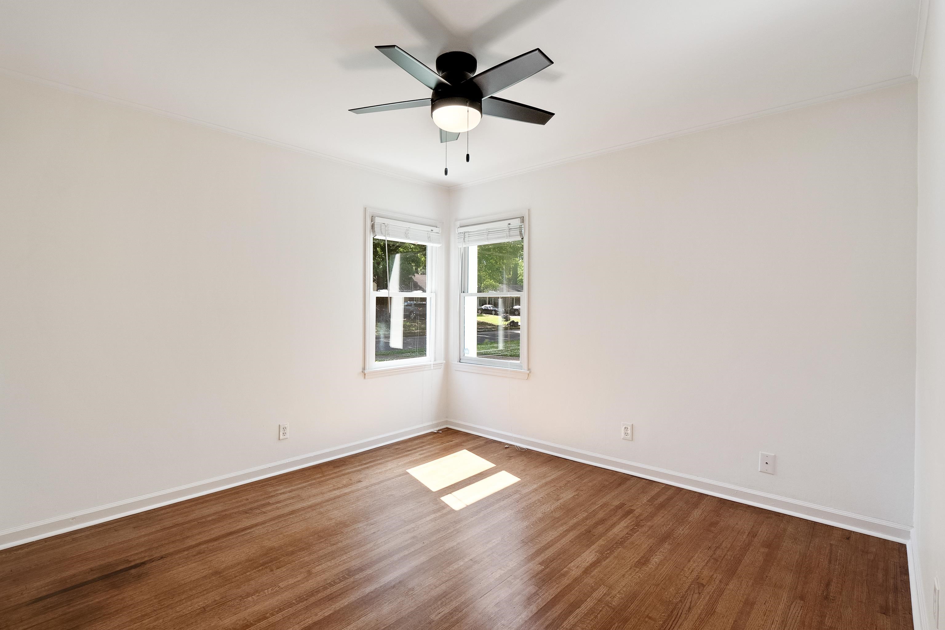 4412 Helene Road Memphis, TN 38117 - Photo 11 of 19 wooden floor in an empty room with a window
