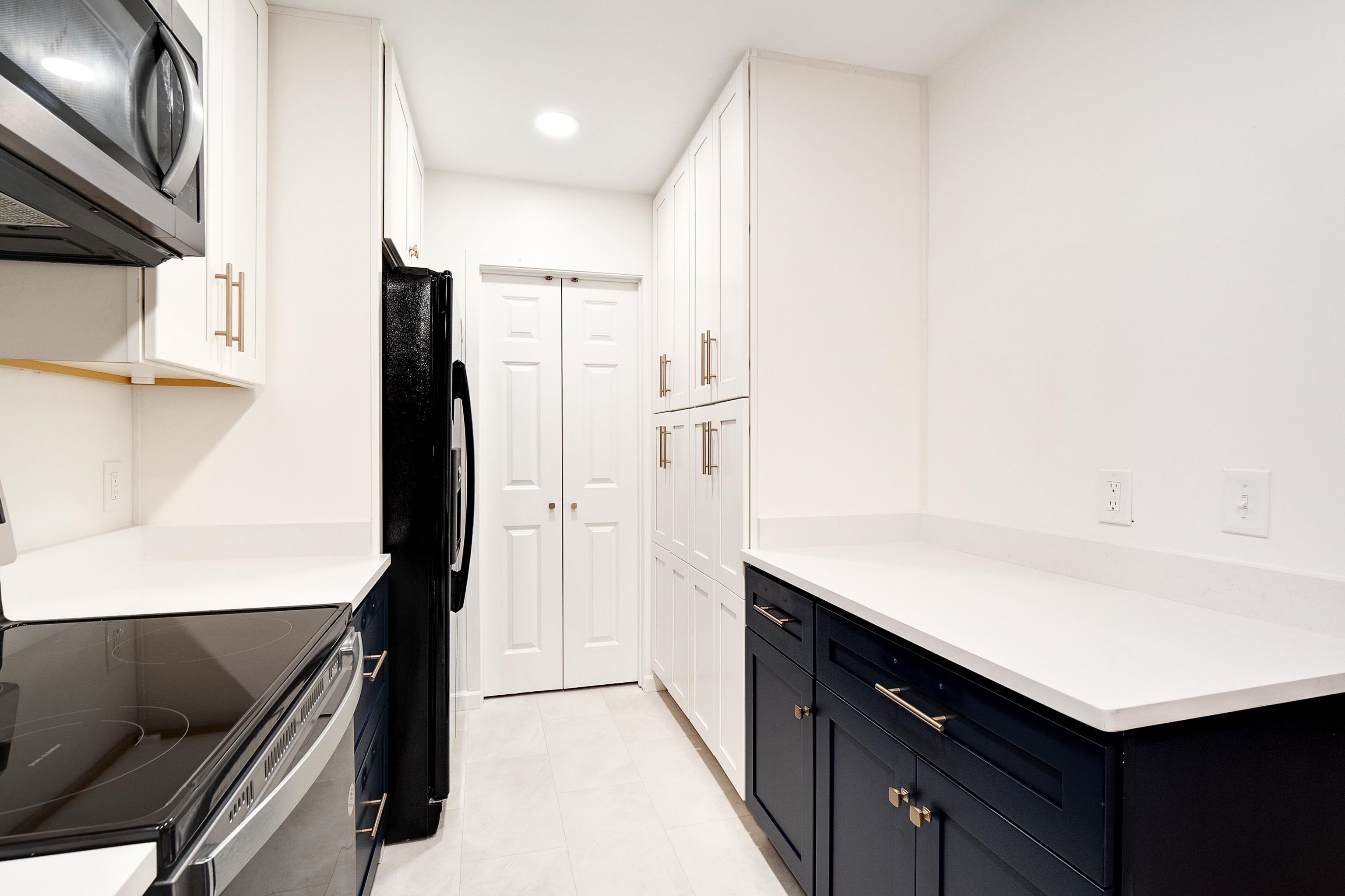 4412 Helene Road Memphis, TN 38117 - Photo 4 of 19 a kitchen with a sink appliances and cabinets