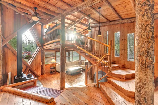 a view of a balcony with wooden floor