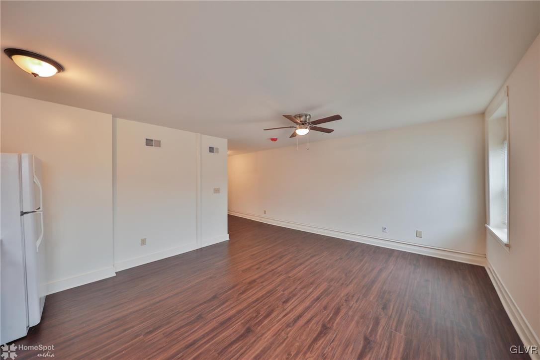 108 South Main Street, Unit 3A Alburtis, PA 18011 - Photo 17 of 35 wooden floor in an empty room with a window