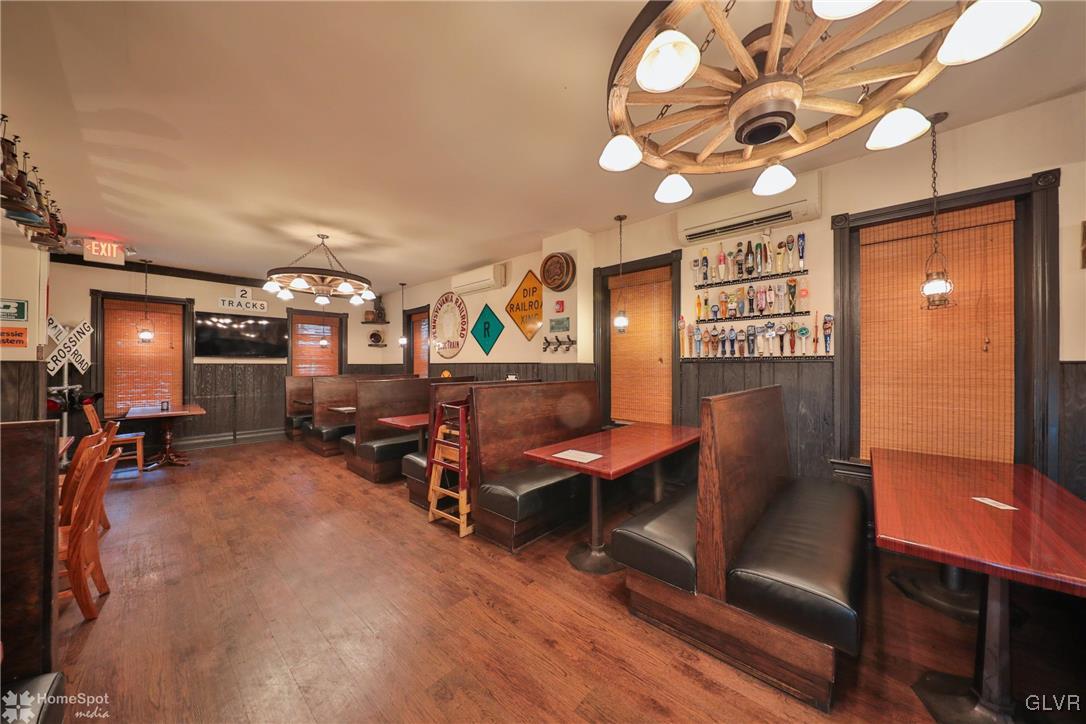 108 South Main Street, Unit 3A Alburtis, PA 18011 - Photo 28 of 35 a living room with furniture a flat screen tv and a large window