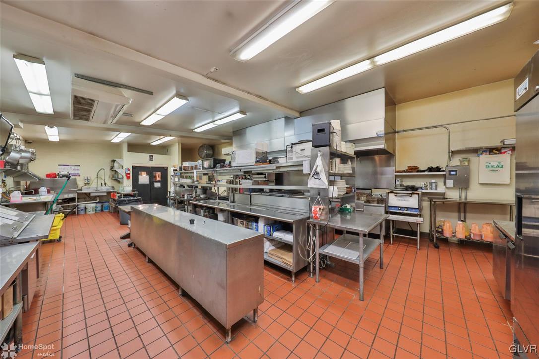 108 South Main Street, Unit 3A Alburtis, PA 18011 - Photo 30 of 35 a kitchen with lots of counter top space and furniture