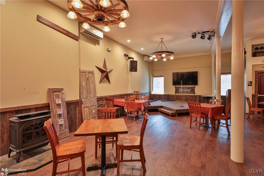 108 South Main Street, Unit 3A Alburtis, PA 18011 - Photo 31 of 35 a view of a dining room with furniture and wooden floor