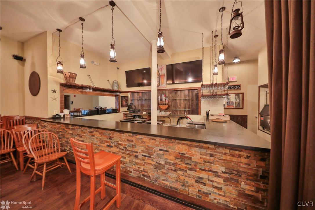 108 South Main Street, Unit 3A Alburtis, PA 18011 - Photo 32 of 35 a large kitchen with a table and chairs