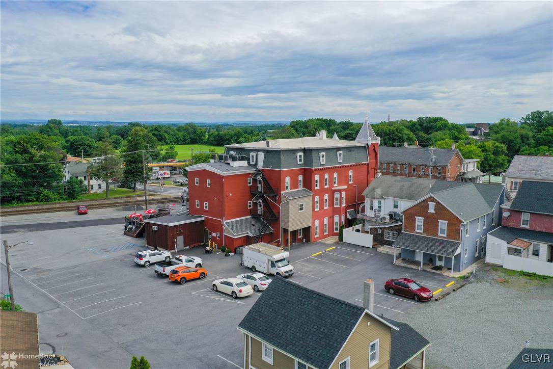 108 South Main Street, Unit 3A Alburtis, PA 18011 - Photo 34 of 35 an aerial view of a yard with table and chairs