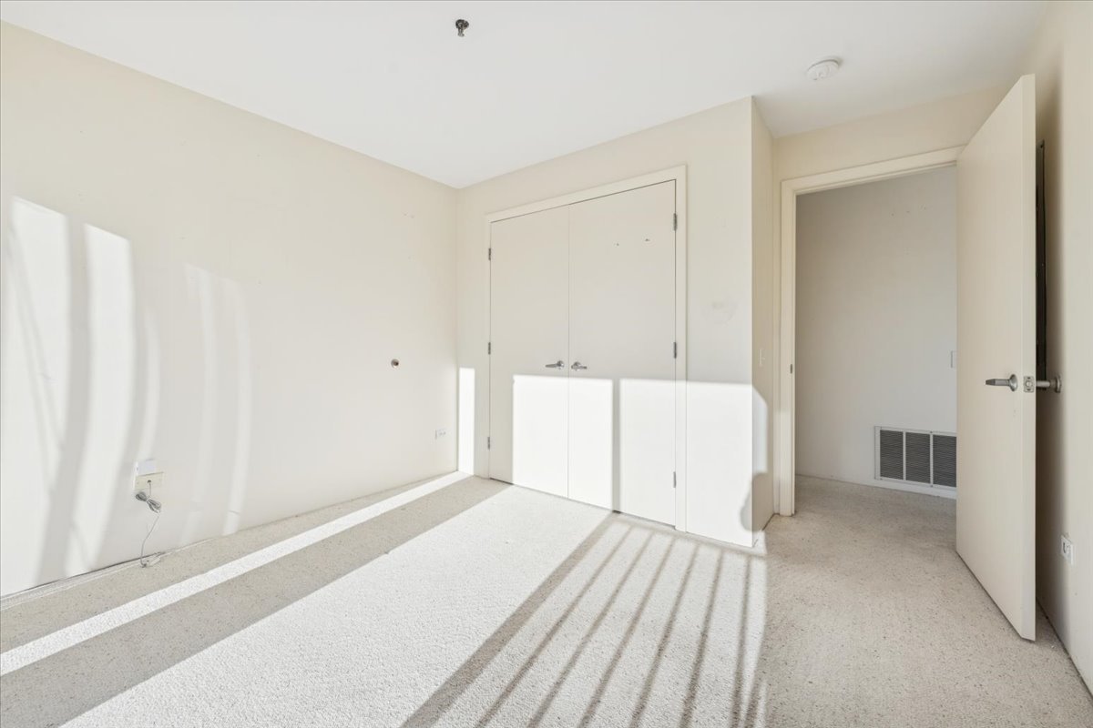 351 Kelburn Road, Unit 312 Deerfield, IL 60015 - Photo 20 of 33 a view of a room with white walls