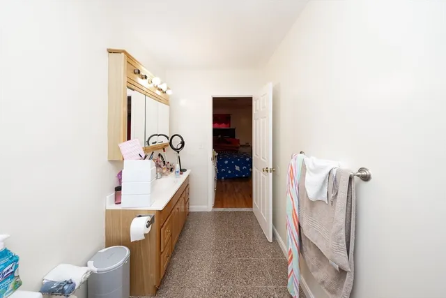 a hallway with a white house