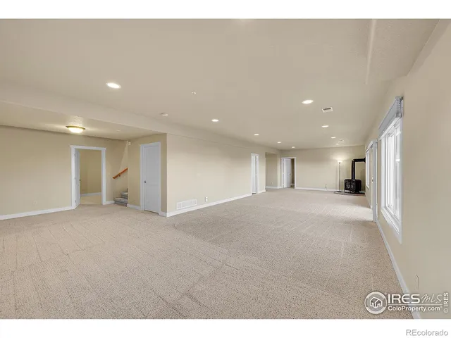 a bathroom with a sink toilet and mirror