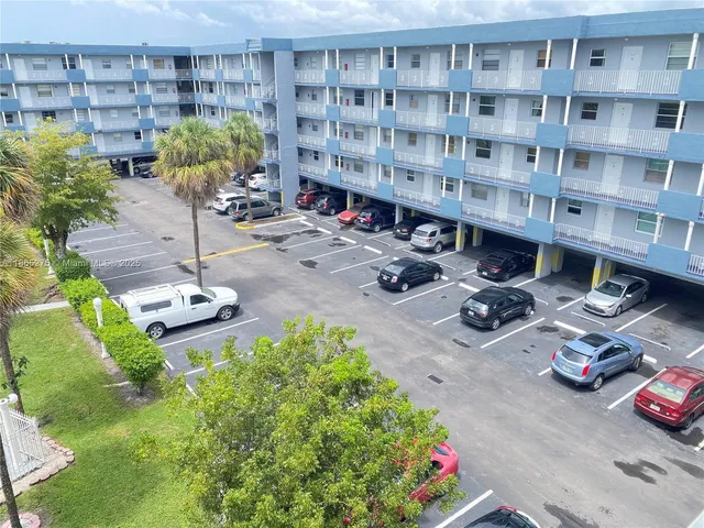 a view of a chairs and table in a patio