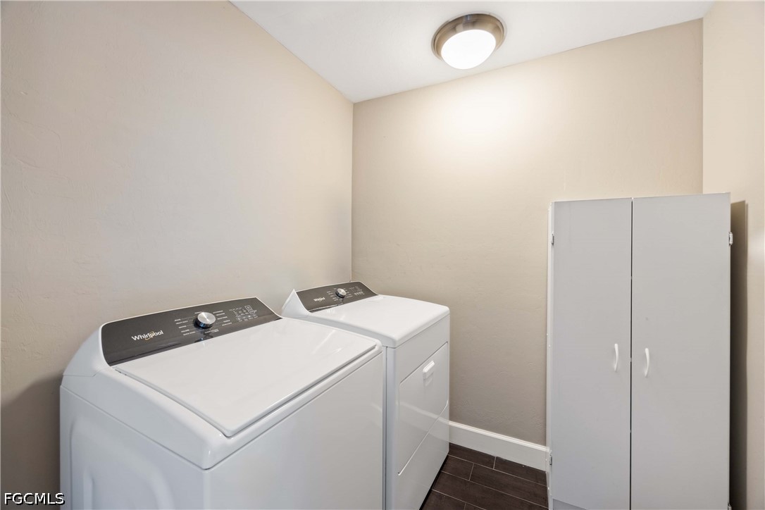 856 104th Avenue North Naples, FL 34108 - Photo 19 of 35 a utility room with dryer and washer