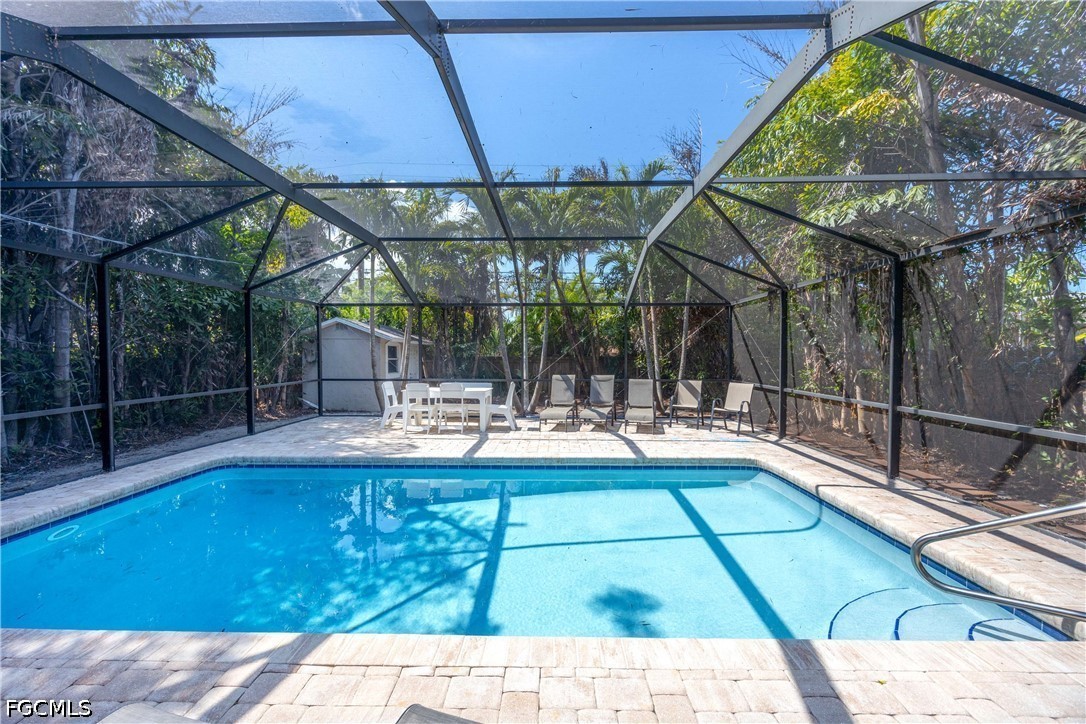 856 104th Avenue North Naples, FL 34108 - Photo 3 of 35 a view of swimming pool with a patio