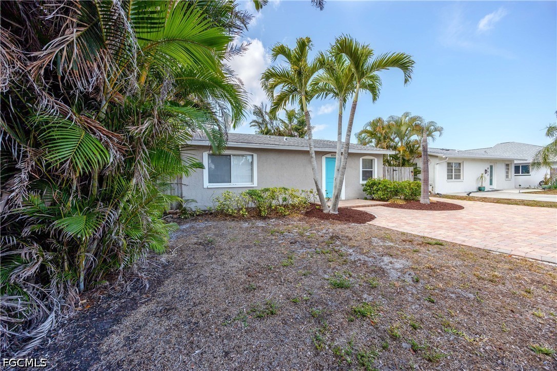 856 104th Avenue North Naples, FL 34108 - Photo 35 of 35 a view of a house with a yard and plant