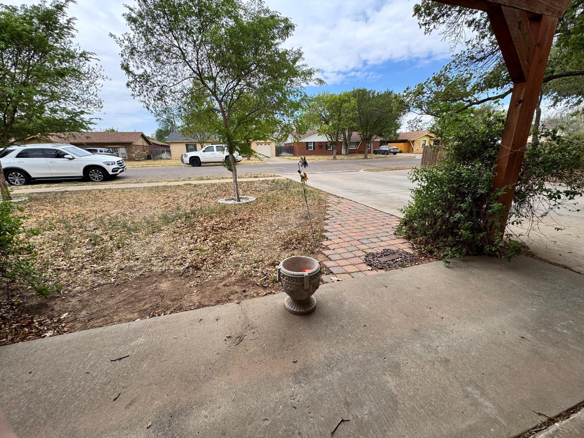 4705 Goodnight Trail Amarillo, TX 79109 - Photo 2 of 10 a view of street with parked cars