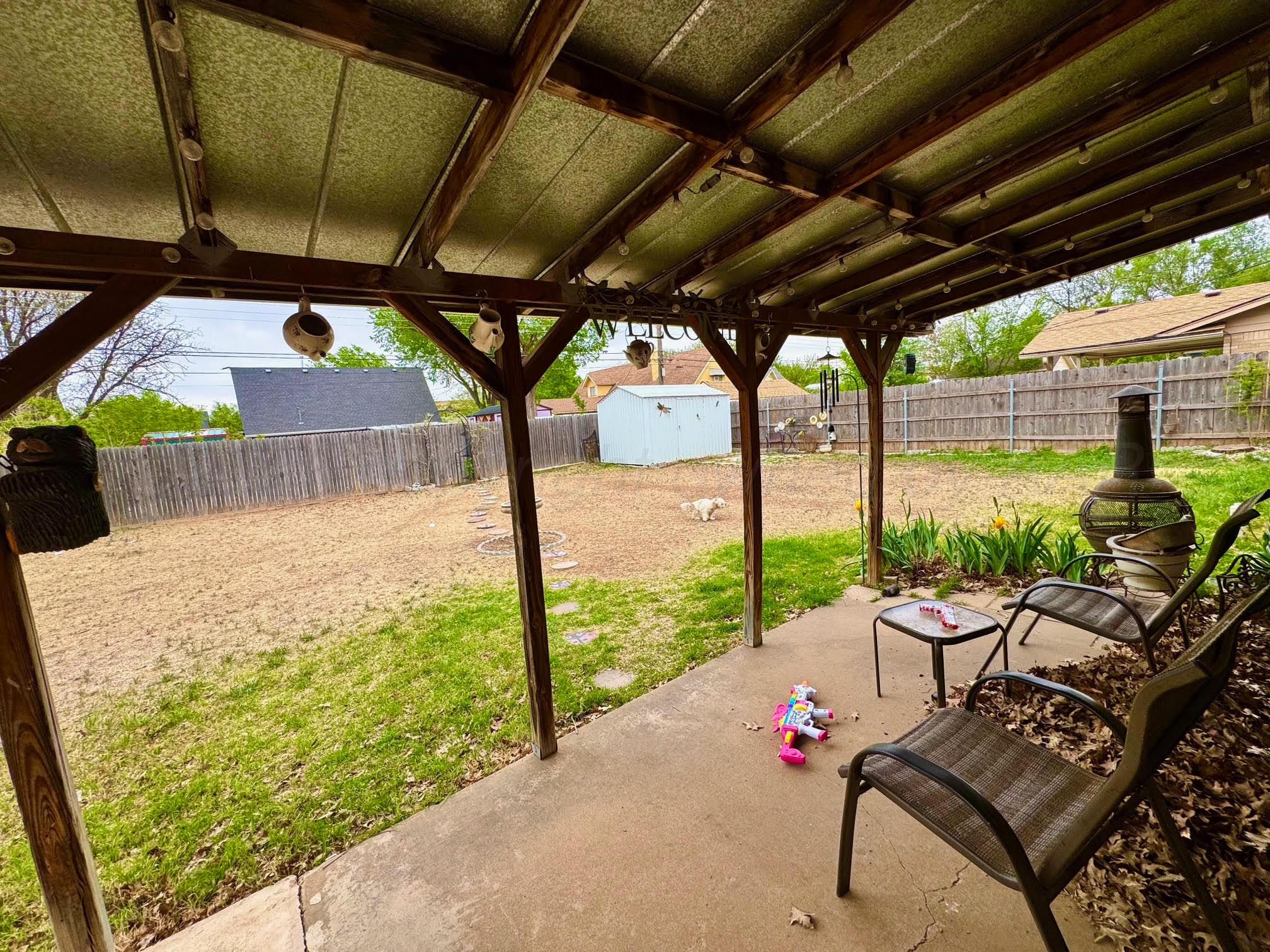 4705 Goodnight Trail Amarillo, TX 79109 - Photo 10 of 10 a view of a porch with furniture and a yard