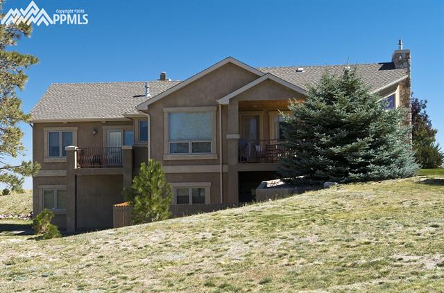 5320 Roundup Ridge Road Colorado Springs, CO 80908 - Photo 18 of 18 Side of house includes privacy fenced area.