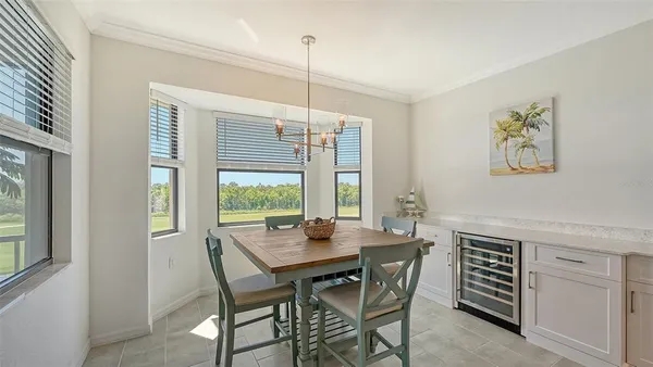 a kitchen with stainless steel appliances a white stove top oven and cabinets