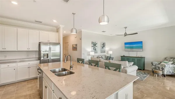 a bedroom with a bed and cabinets