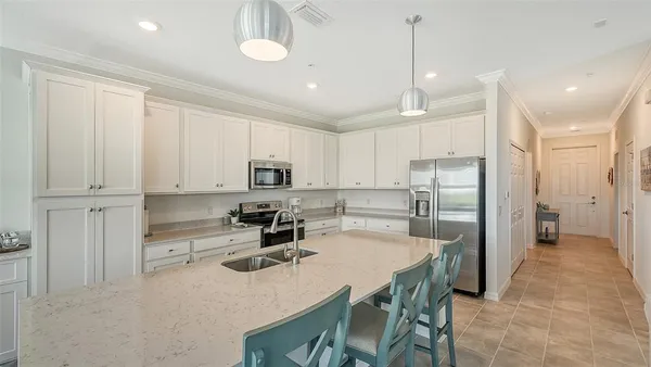 a bathroom with a sink and washing machine