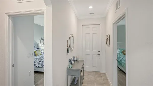 a bathroom with a double vanity sink toilet and shower
