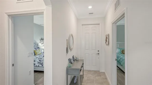 a bathroom with a double vanity sink toilet and shower
