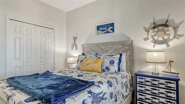 a view of a large building with a big yard and plants