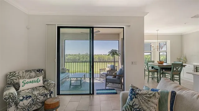 a view of kitchen with dining table and chairs