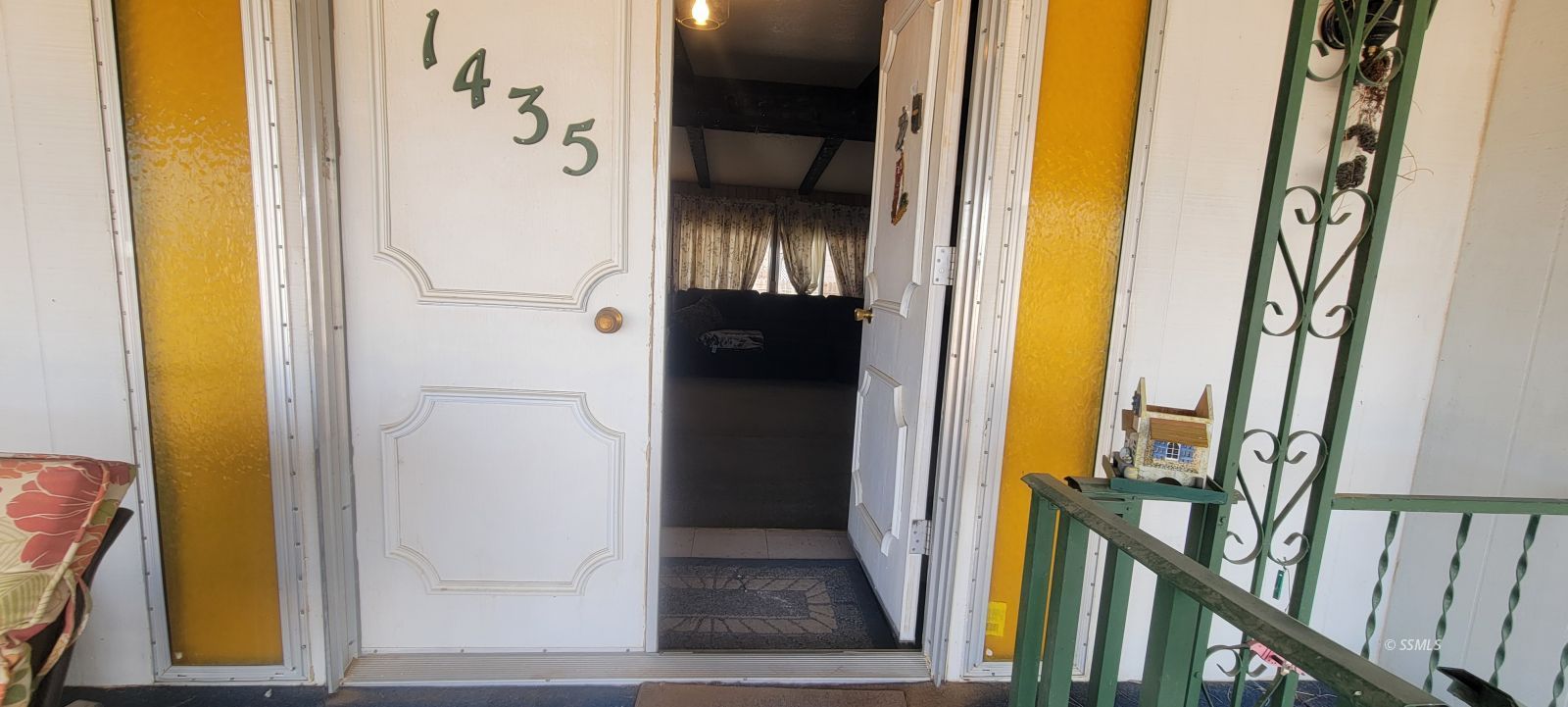 1435 West Perch Avenue Ridgecrest, CA 93555 - Photo 24 of 40 a view of a hallway with wooden floor and stairs