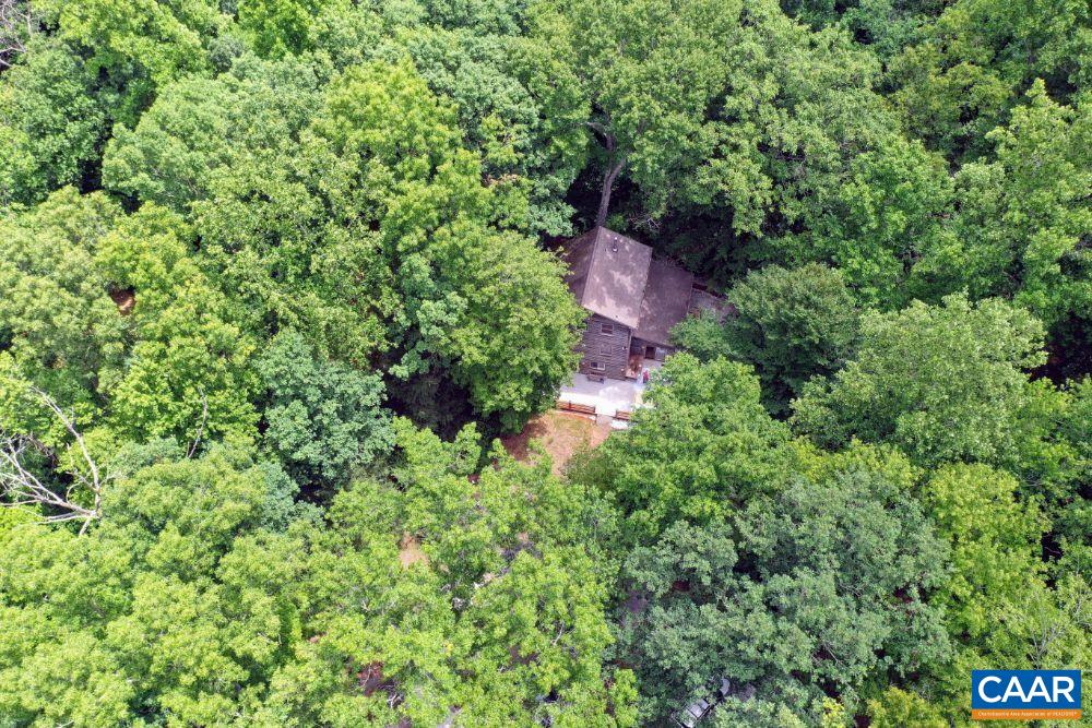 1108 Berry Hill Road Nellysford, VA 22958 - Photo 19 of 32 an aerial view of residential house with outdoor space and trees all around