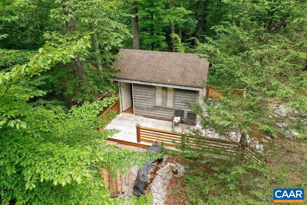 1108 Berry Hill Road Nellysford, VA 22958 - Photo 10 of 32 front view of a house with a yard