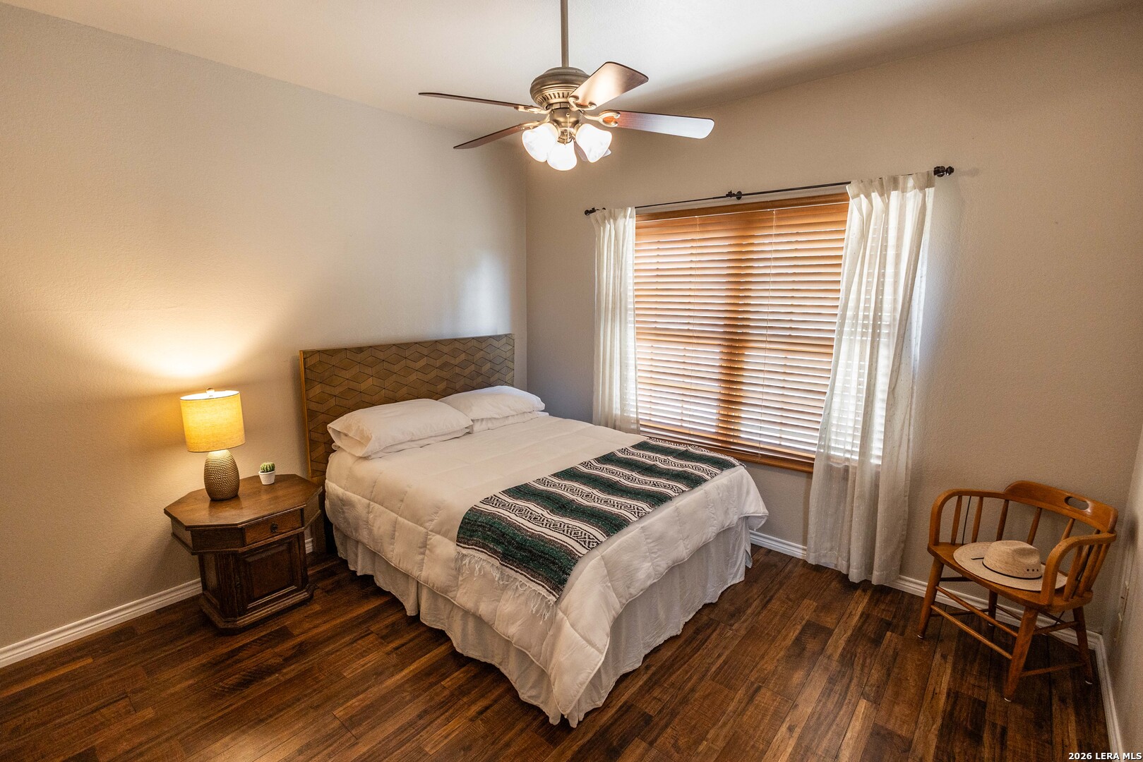 5499 Agape Road Uvalde, TX 78801 - Photo 35 of 54 a bedroom with a bed and a window