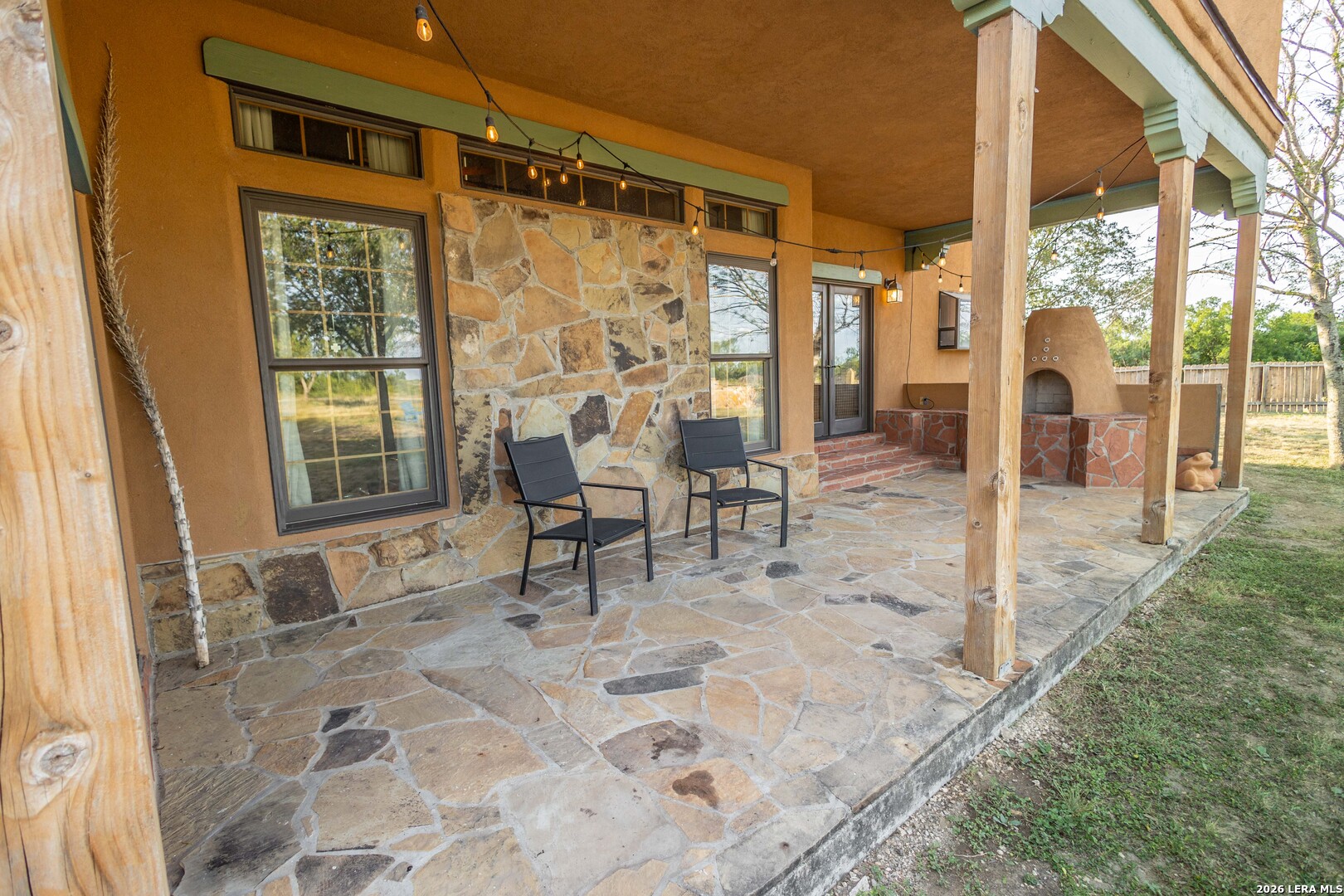 5499 Agape Road Uvalde, TX 78801 - Photo 43 of 54 a balcony with chairs and outdoor view