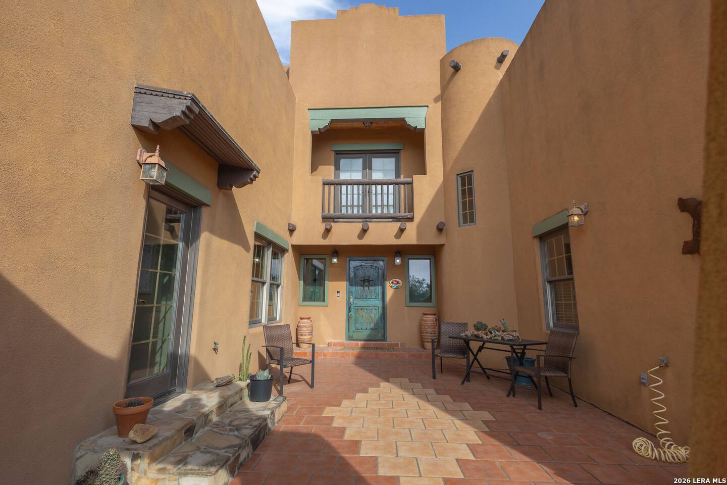 5499 Agape Road Uvalde, TX 78801 - Photo 53 of 54 a view of a brick house with outdoor seating space