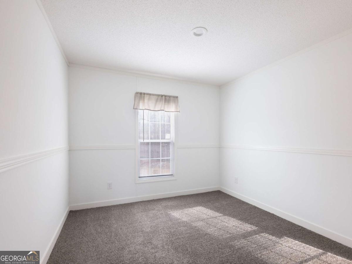 5222 Bogus Road Gainesville, GA 30506 - Photo 26 of 43 an empty room with a window