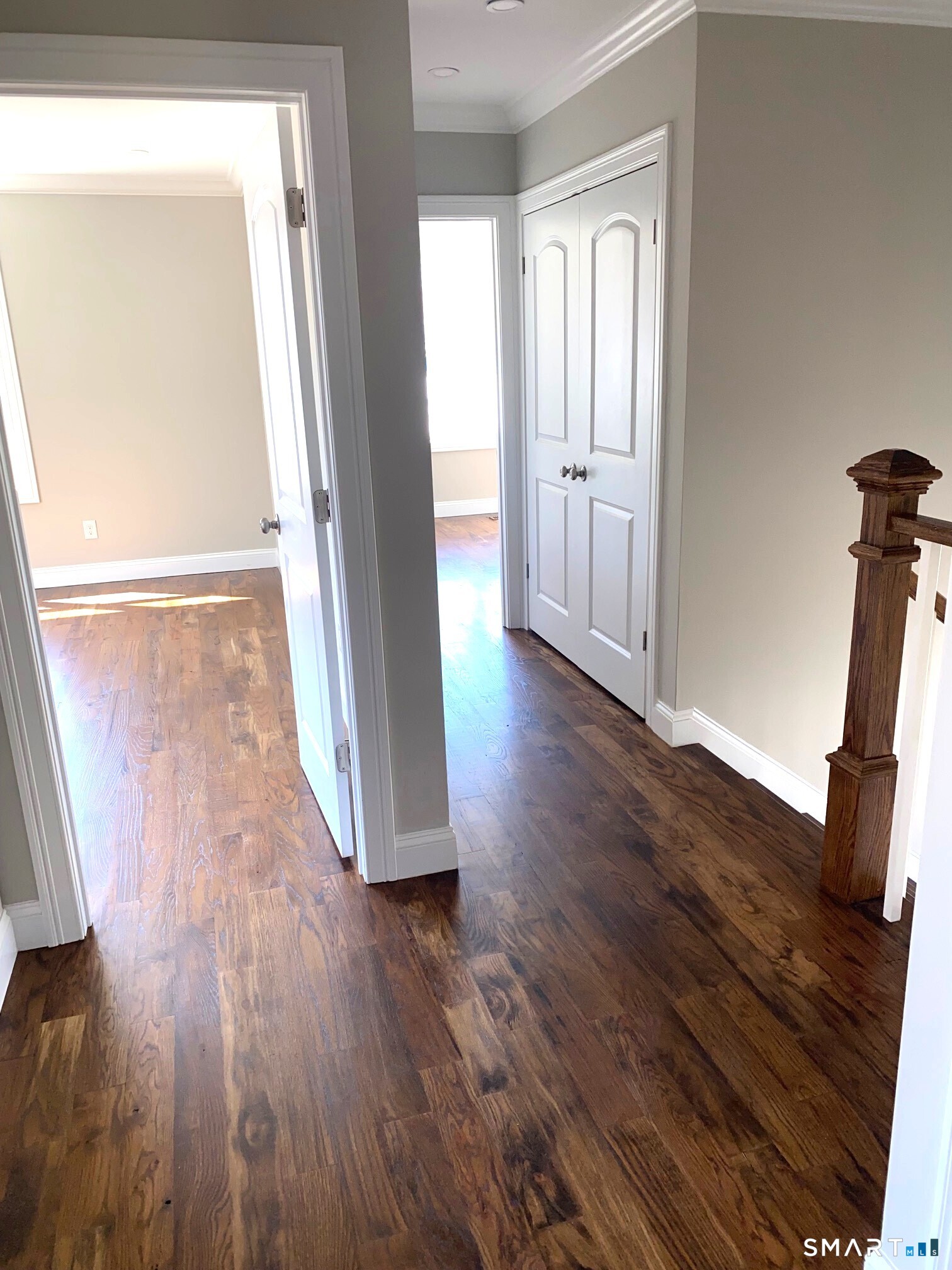 277 Alba Avenue Bridgeport, CT 06606 - Photo 21 of 37 an empty room with wooden floor and windows