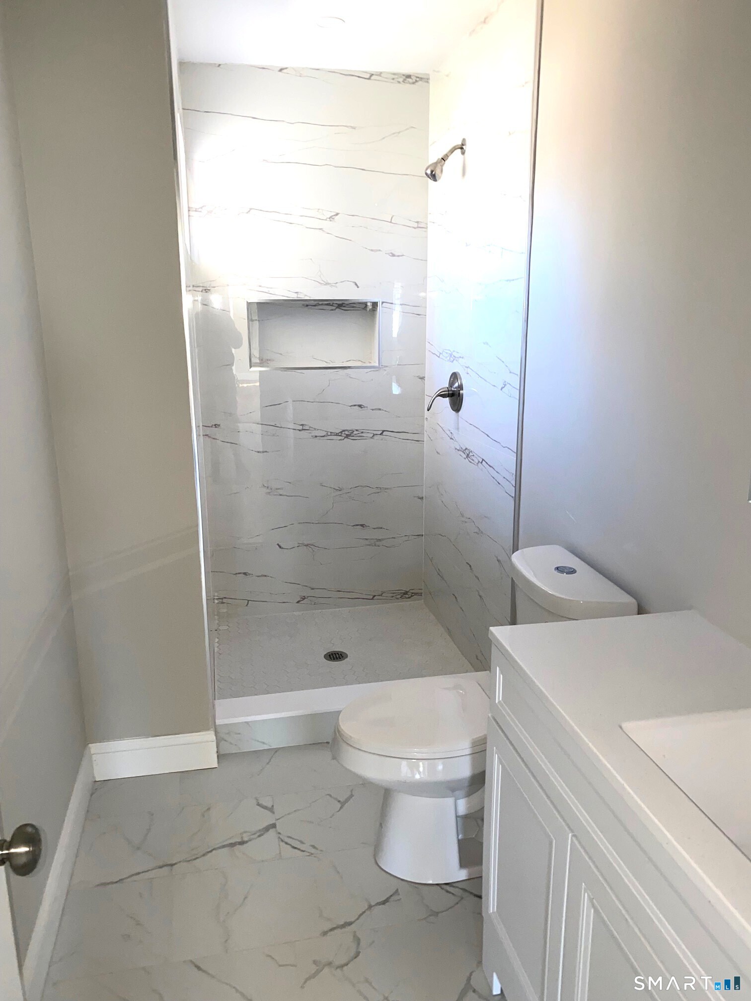 277 Alba Avenue Bridgeport, CT 06606 - Photo 22 of 37 a bathroom with a shower a toilet and a sink
