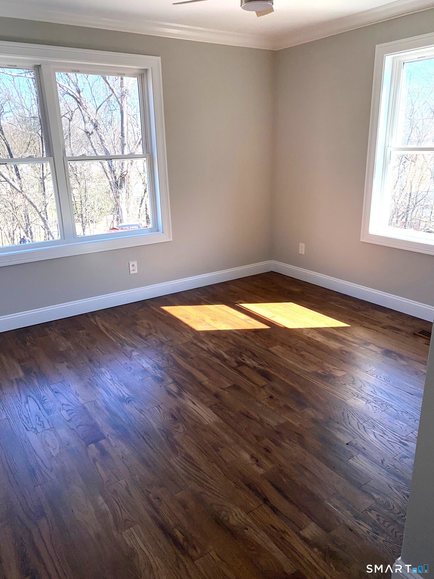 277 Alba Avenue Bridgeport, CT 06606 - Photo 29 of 37 a view of empty room with wooden floor and fan