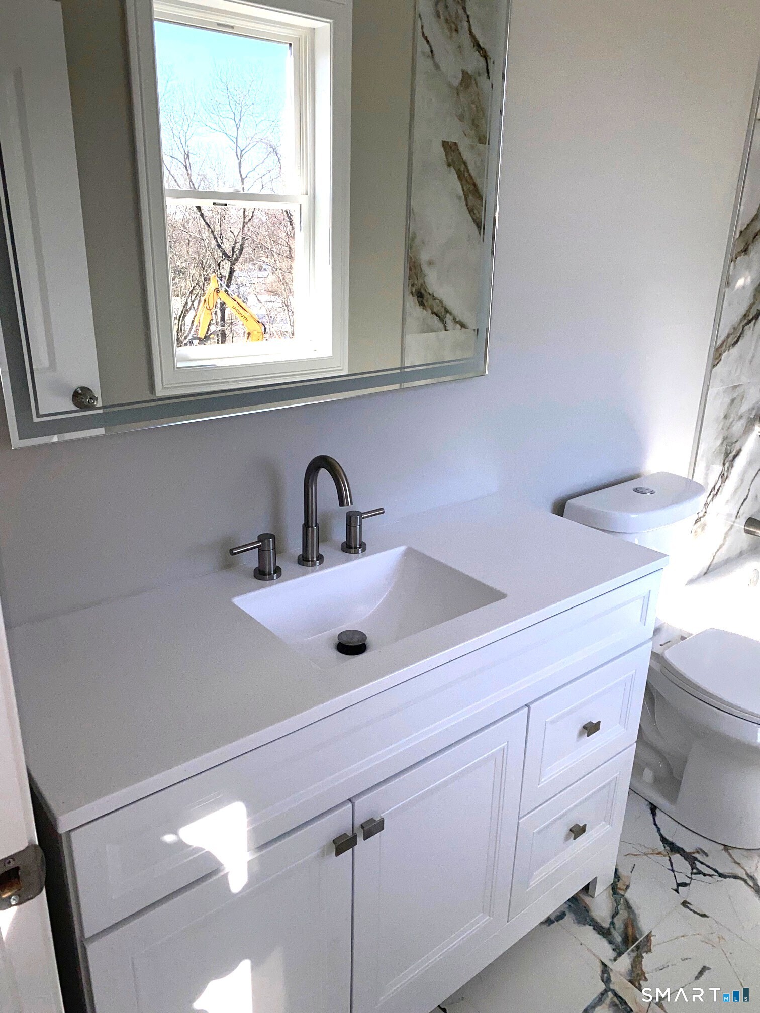 277 Alba Avenue Bridgeport, CT 06606 - Photo 32 of 37 a close view of sink and tap