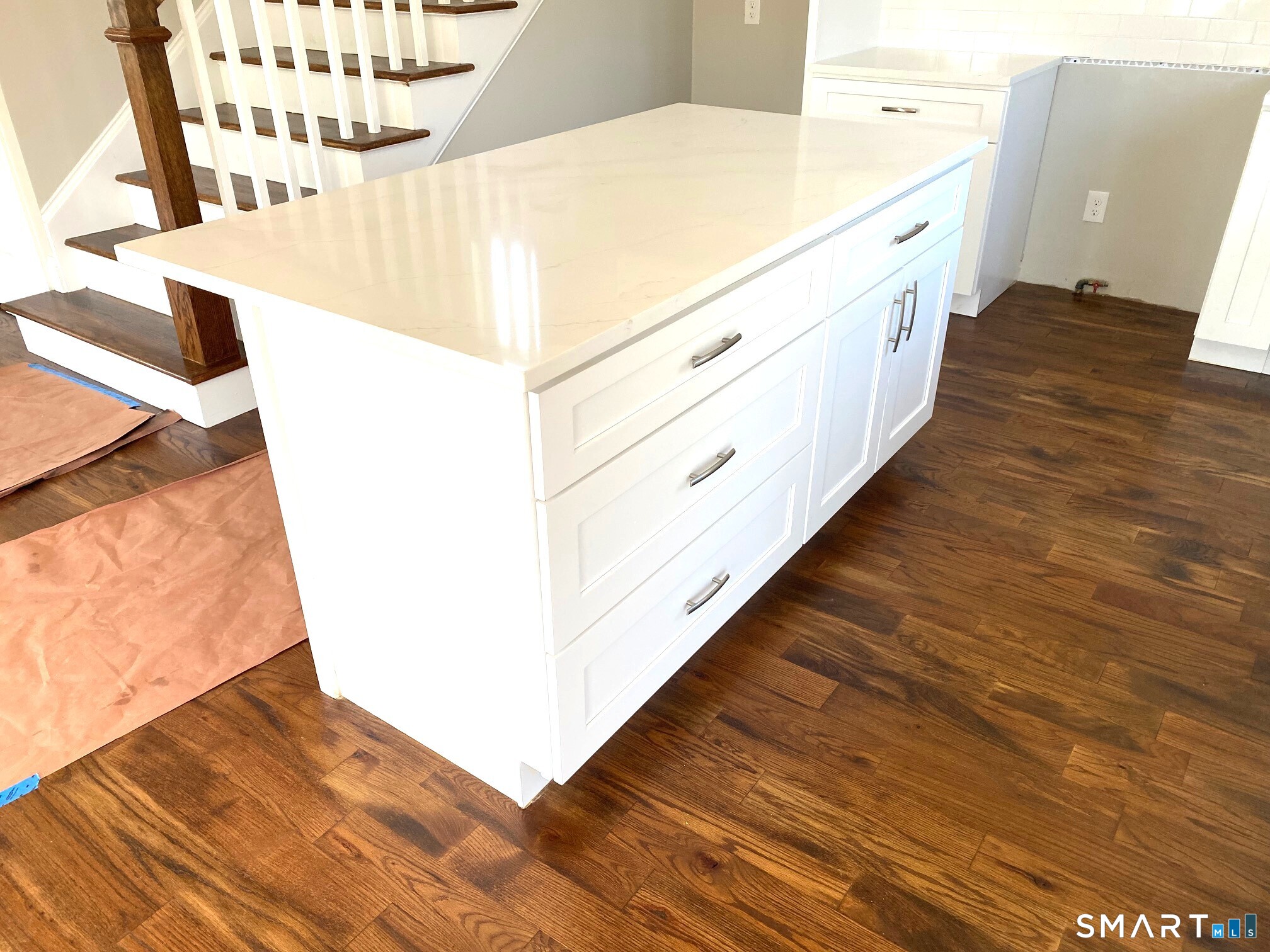277 Alba Avenue Bridgeport, CT 06606 - Photo 9 of 37 a view of a hallway with wooden floor