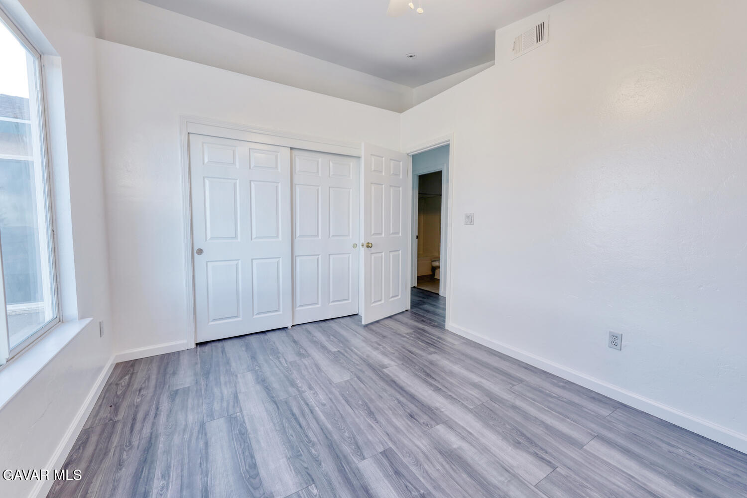 26801 Cabriolet Court Tehachapi, CA 93561 - Photo 31 of 60 an empty room with wooden floor