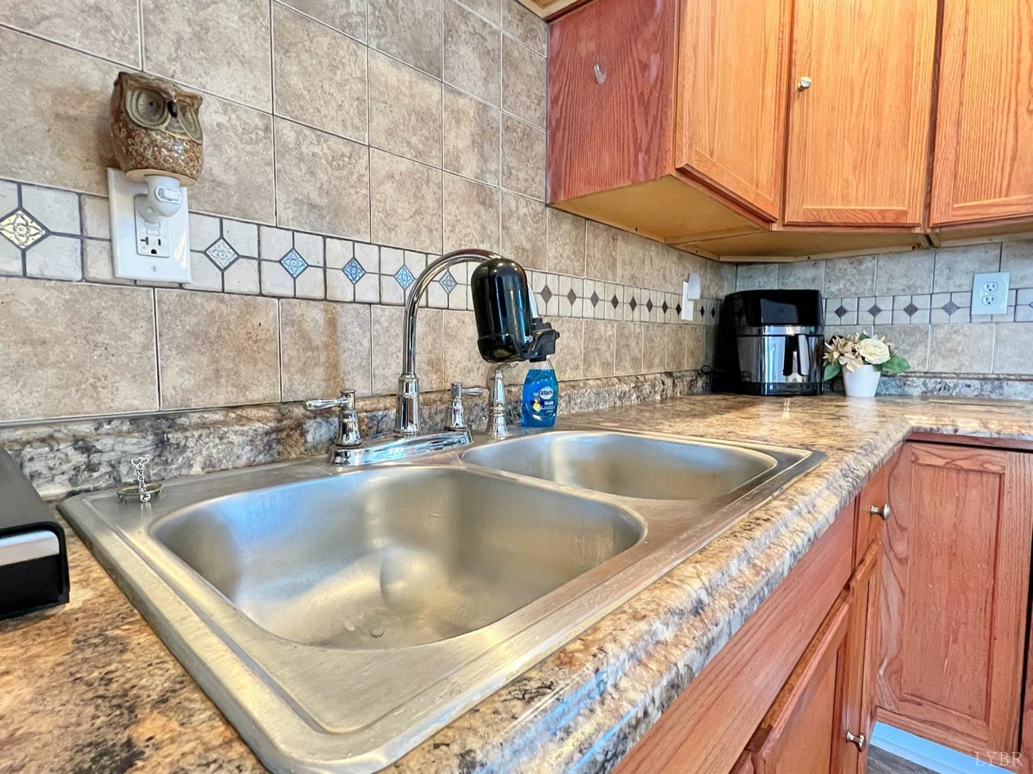 300 Spring Mill Road Concord, VA 24538 - Photo 9 of 30 a kitchen with a sink and a stove top oven