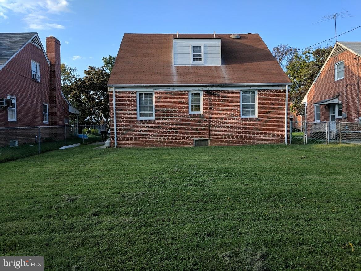 3305 Marnat Road Baltimore, MD 21208 - Photo 2 of 7 a front view of a house with a garden