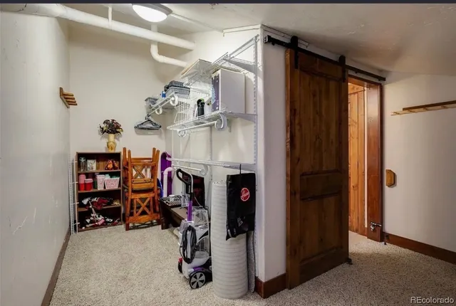 a bedroom with furniture and a bed