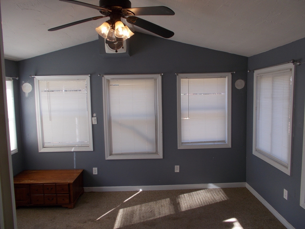 146 South Meadow Road Carver, MA 02330 - Photo 8 of 15 a living room with furniture and a window