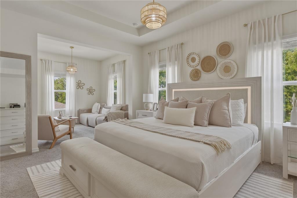 17664 Northwest 173rd Road Alachua, FL 32615 - Photo 17 of 31 a bedroom with a bed and a chandelier