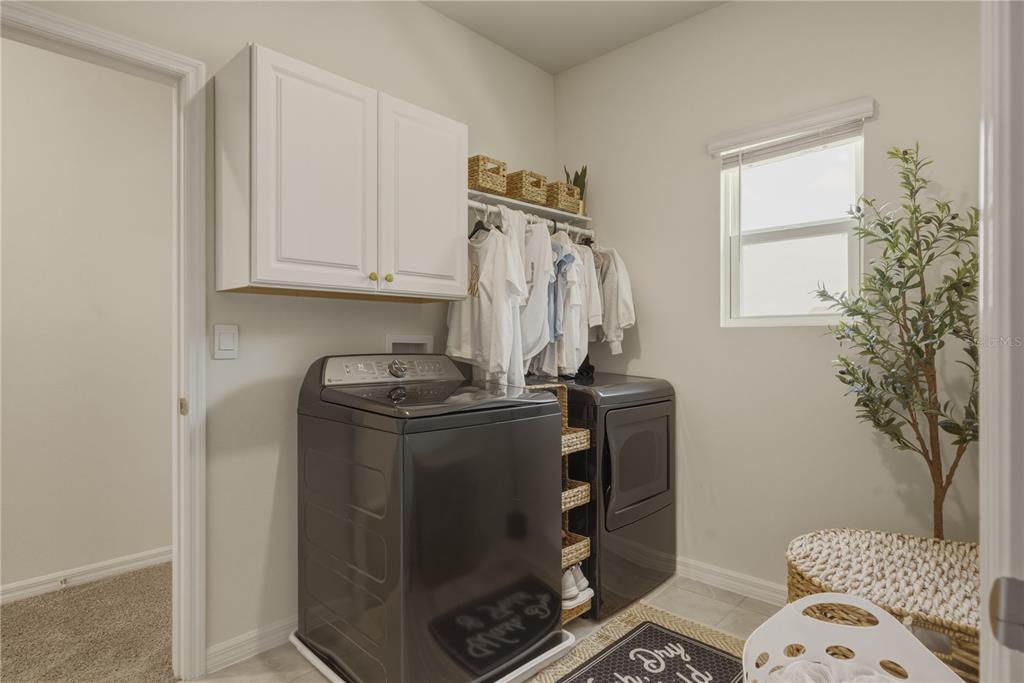 17664 Northwest 173rd Road Alachua, FL 32615 - Photo 29 of 31 a room with storage and utility