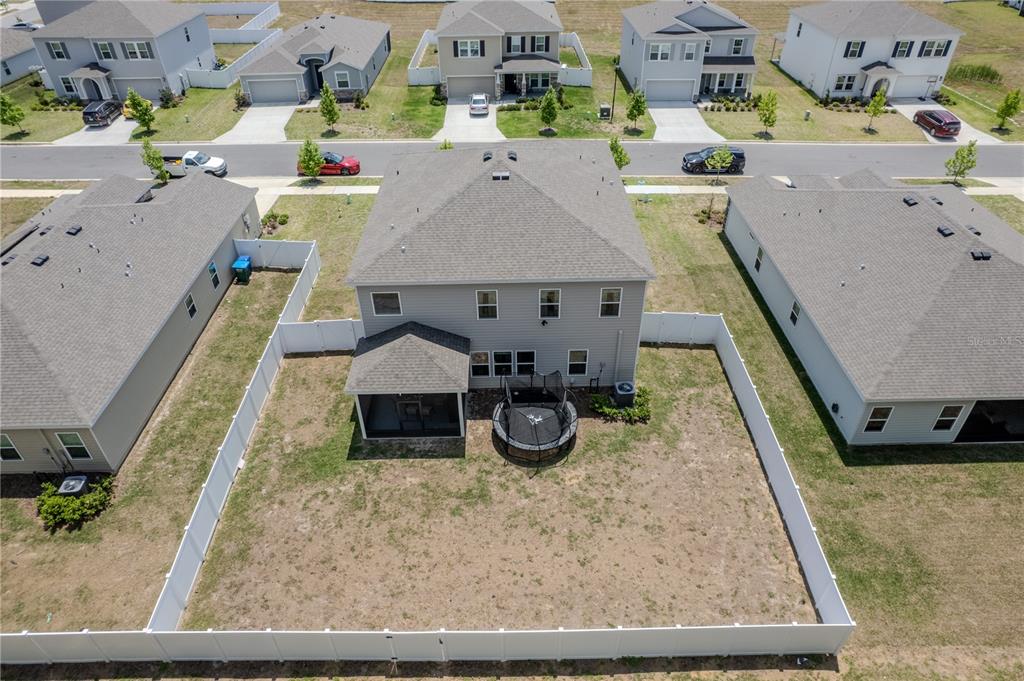 17664 Northwest 173rd Road Alachua, FL 32615 - Photo 31 of 31 an aerial view of residential houses with outdoor space