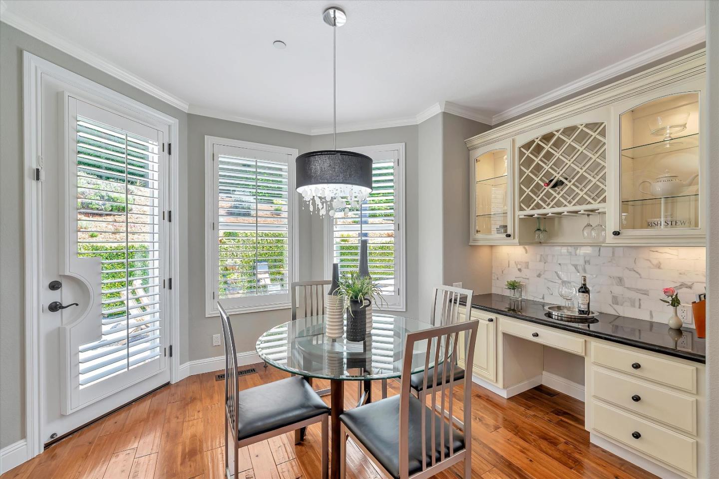2380 Sunflower Circle Gilroy, CA 95020 - Photo 17 of 43 a dining room with furniture a chandelier and wooden floor